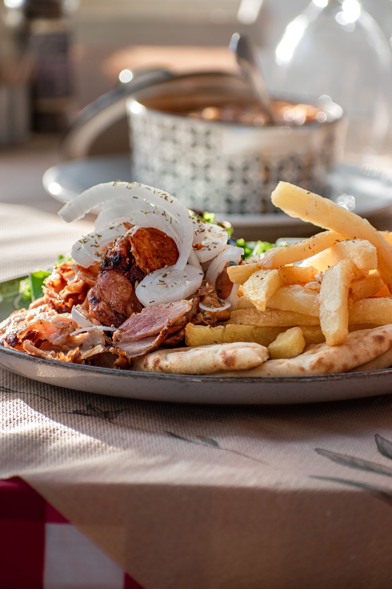 Gyros plate with pita and hand-cut fries