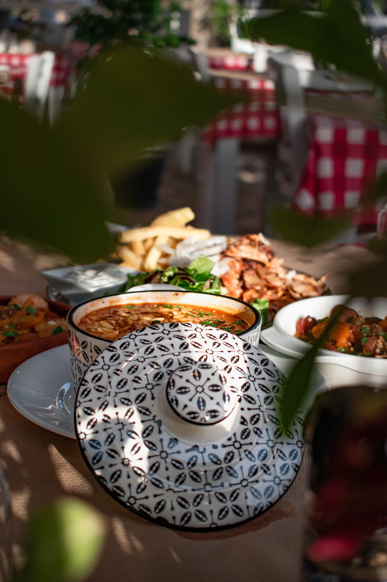 A full table — giouvetsi, gyros and meze